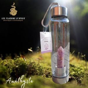 Bouteille avec une pointe d'améthyste
